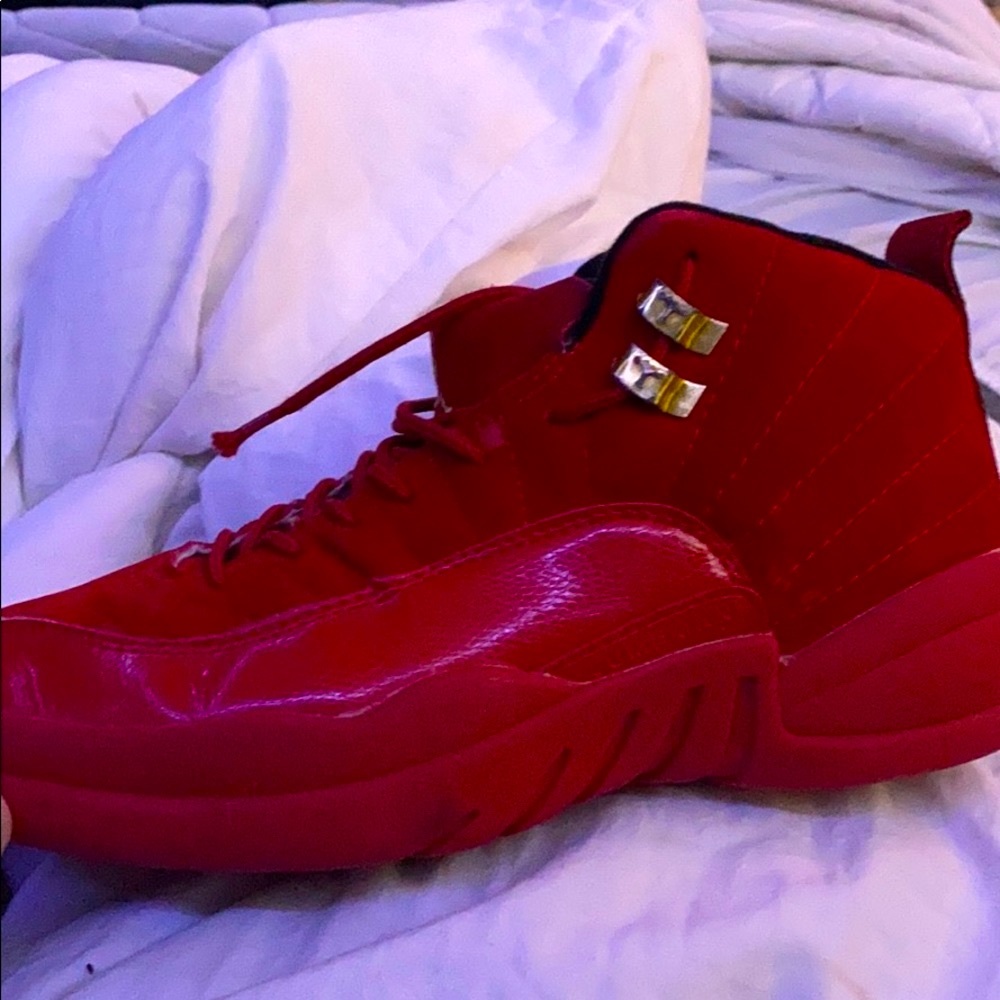 Red jordan 12’s
